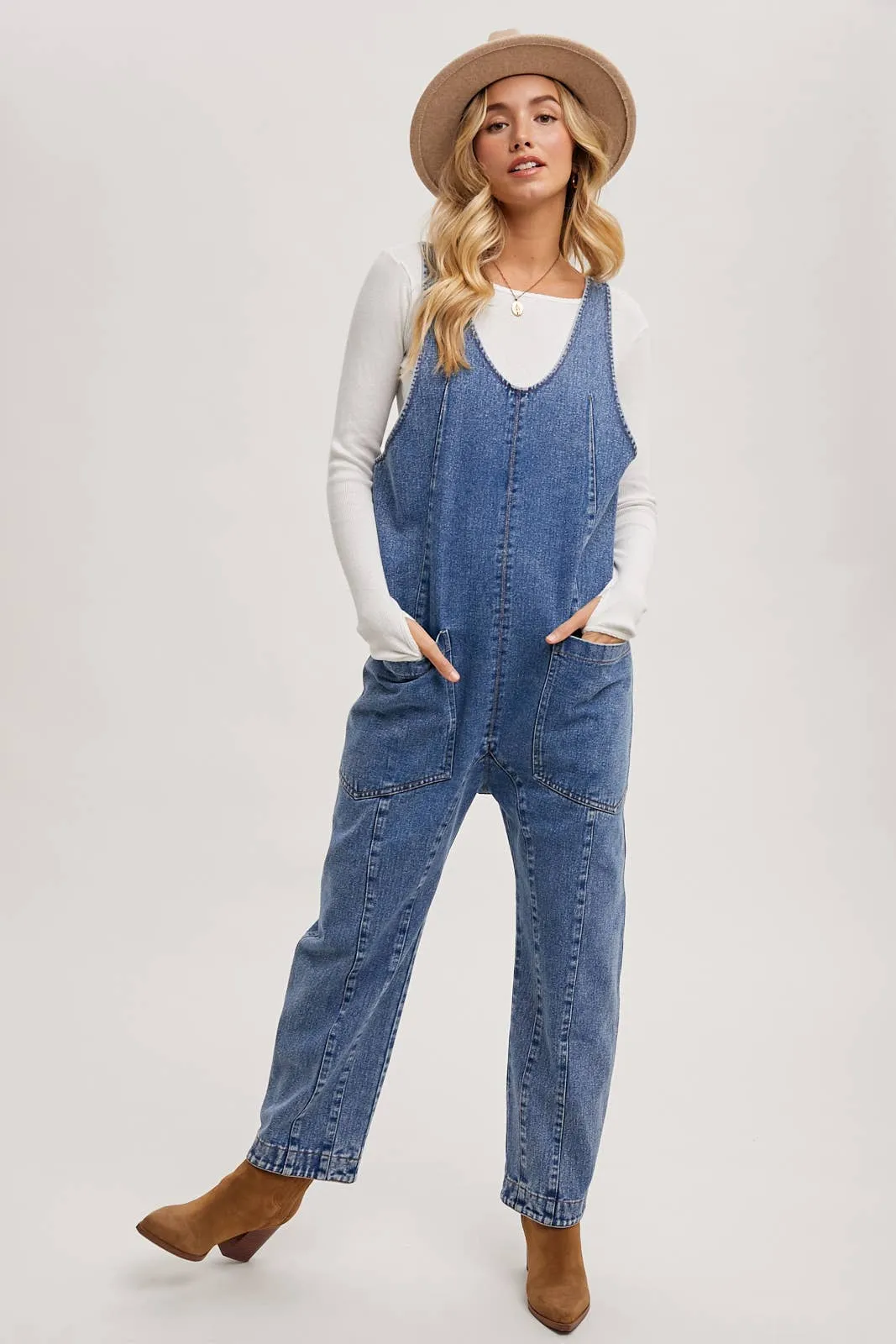 DENIM JUMPSUIT OVERALL IN A RELAXED FIT WITH HAREM LEGS